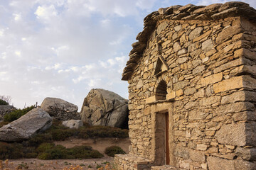 Typical Ikarian stone house with slate roof in the mountain village Vrakades, Ikaria island, Greece