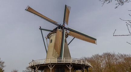 dutch windmill against a blue sky
