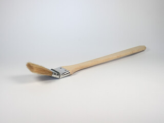 paintbrush on desk with copy space