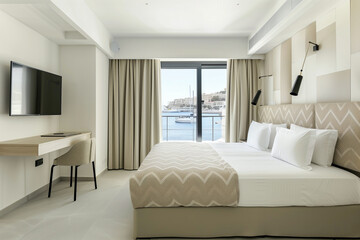 Beautiful decorated room with large bed and loggia with sea view