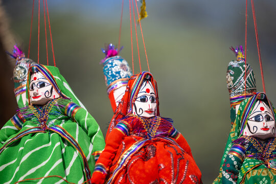 Indian colorful Rajasthani handmade Puppets and Crafts products at fair. Selective focus.