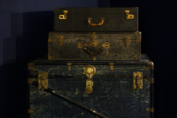 old suitcase on the background of the wall