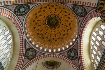 Fototapeta na wymiar Istanbul, Turkey - March 23 2014: Interior of Suleymaniye Mosque and its gigantic dome