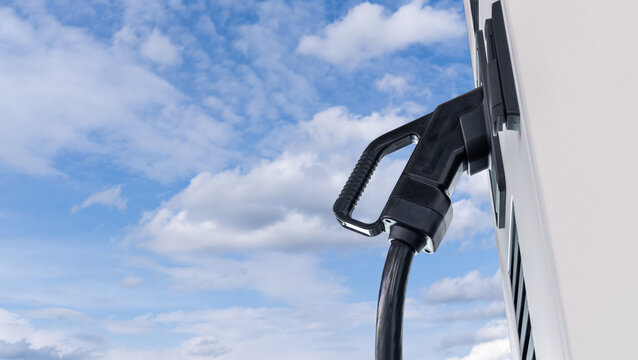 Electric vehicles charging station that takes energy from solar panels. Close up..