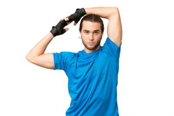 Young handsome man isolated on green chroma background stretching arm