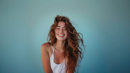Fototapeta premium laughing young American model woman on pastel blue background