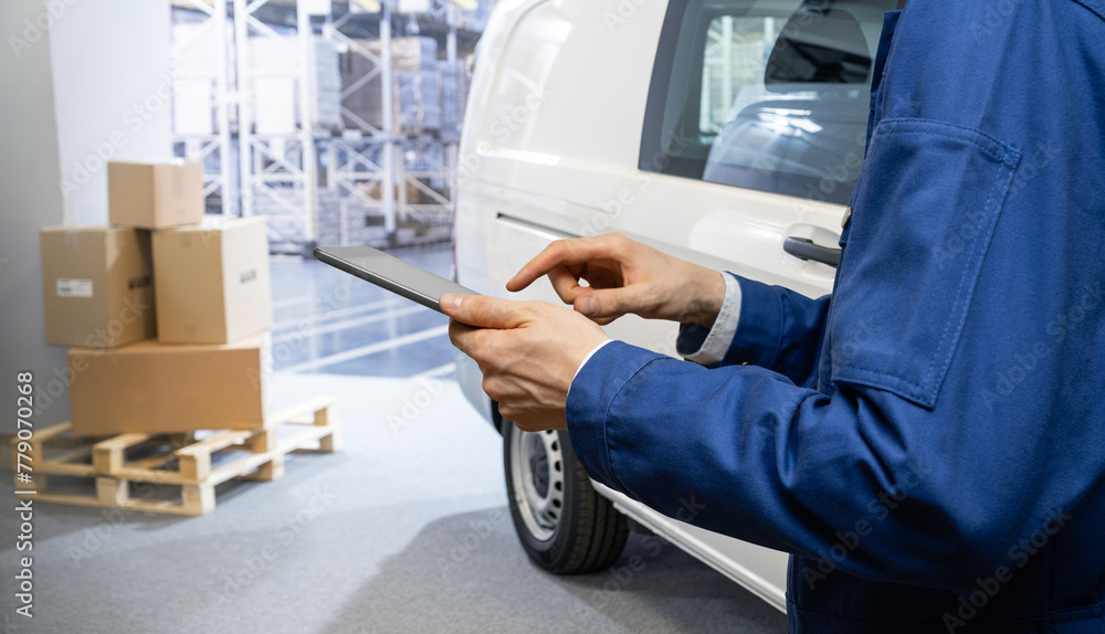 Aufkleber Manager with a digital tablet on the background of van. Fleet and warehouse management..
