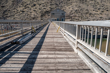 Walkway bridge leading to the controller office of a dam