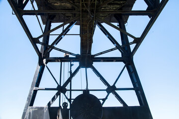 The lower load-bearing part of vintage port industrial crane closeup