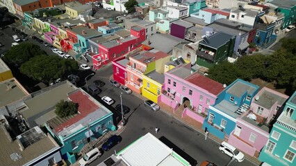 View of the colorful Bo-Kaap in Cape Town, South Africa. A popular daytime destination, hillside Bo-Kaap is known for its narrow cobbled streets lined with colorful houses