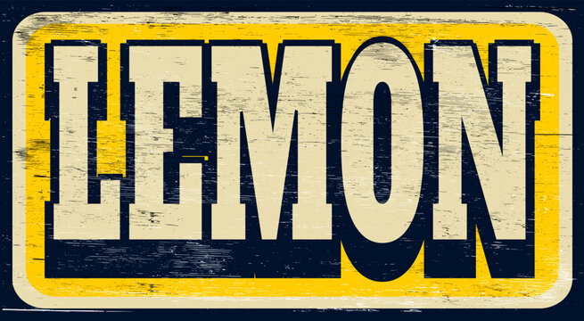 Aged and worn distressed lemon sign on wood