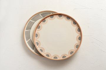 Empty ceramic plates. Top view, on a white background.