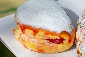Dutch cuisine, fresh baked strawberry cake and croissant with cream and fresh fruits
