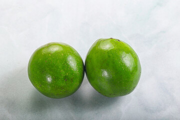 Two ripe green exotic avocado fruit