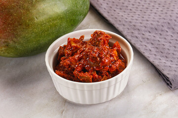 Spicy pickled raw green mango