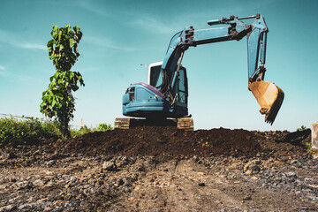 excavator in a field