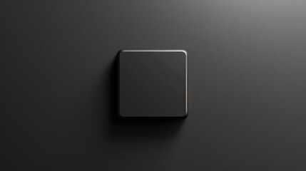 A black square object placed on a dark surface. Suitable for various design projects