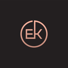EK monogram logo inside gold circle frame.