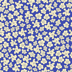 Floral print on a blue background.Vector seamless pattern with white flowers on a blue background.