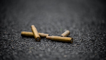 spent ammunition casings on street