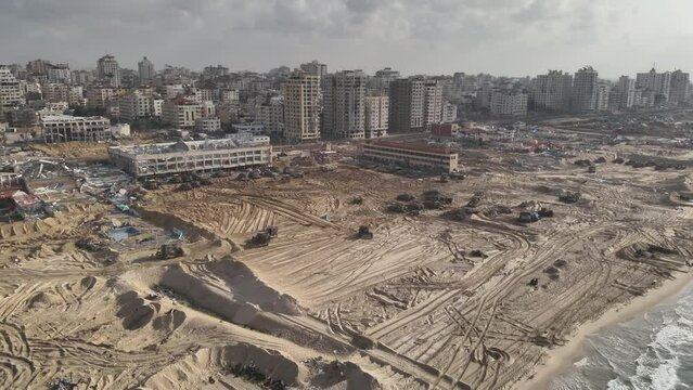 
Rimal neighborhood destroyed and IDF tanks on the beach, Gaza, aerial 
Drone view over North Gaza buildings bombarded,Gaza-March,20,2024

