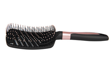 Massage comb for combing hair. Plastic brush with metal corners for detangling hair. On an isolated...