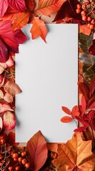 A vertical autumn-themed frame with vibrant leaves and berries surrounding a blank white space