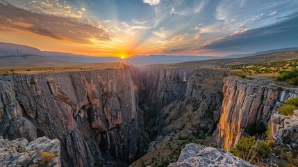 Stunning canyon panorama at sunset, showcasing vibrant hues and nature's artistry. Explore the breathtaking Tasyaran canyon in Turkey's vast valley.