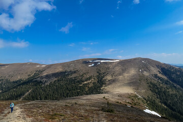 Panoramic view of mountain peak of Amerinkogel on Packalpe, Lavanttal Alps in Styria, Austria. Remote alpine hill landscape in Austrian Alps. Wanderlust. Tranquil serene scene on alpine meadows