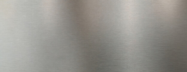 Texture of grey metal or a material without a distinct pattern. Metallic sheen plain surface, background. Panorama with copy space.