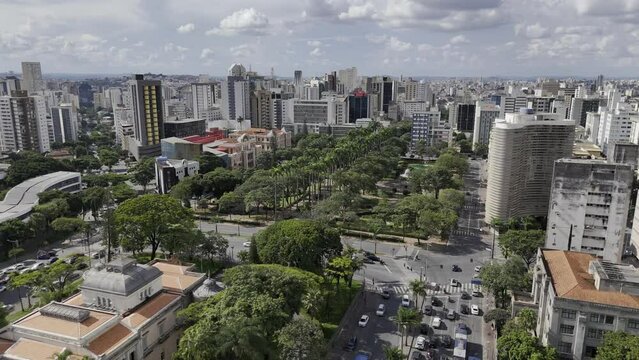 Drone orbits to left behind Palacio da Liberdade overlooking Pra&ccedil;a da Liberdade in Belo Horizonte