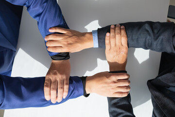 Businessmen and investors shake hands as symbol of joint venture after discussing, consulting and making contract to invest in business together. business people shaking hands as symbol of cooperation - obrazy, fototapety, plakaty