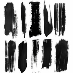 A collection of black paint strokes on a white background. Suitable for artistic projects - obrazy, fototapety, plakaty