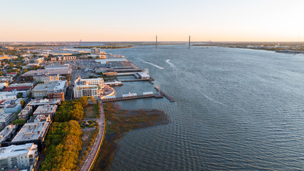 Sunrise over downtown Charleston with the Arthur Ravenel Jr. Bridge spanning the Cooper River in...