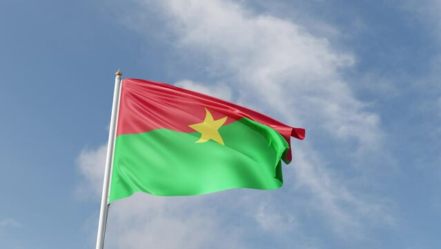 flag of burkina faso on a blue sky, waving in the wind, symbol of the burkina faso, african country, green and red with yellow star, tall flagpole, sunny day