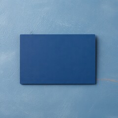 Blue blank business card template empty mock-up at blue textured background with copy space for text photo or product