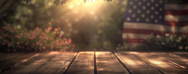 An idyllic American patriotic scene with a wooden surface in the foreground, soft focus flowers, and a blurred USA flag in the warm, glowing sunlight