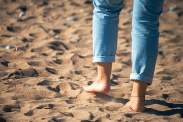 Sands of Serenity: A Woman's Barefoot Walk