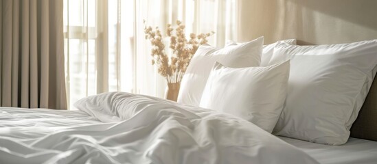 Naklejka premium An assortment of various pillows arranged on a neatly made bed inside a cozy bedroom