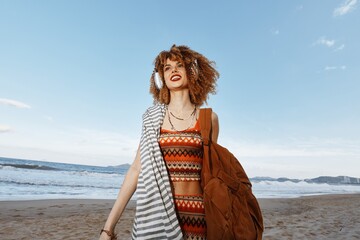 Summer Bliss: Smiling Woman on the Beach, Embracing Freedom and Enjoying the Sea