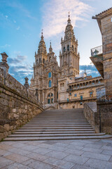 Santiago de Compostela Cathedral at sunrise, Galicia, Spain. Galician gothic church. Popular touristic landmark. Vertical orientation - 779234024