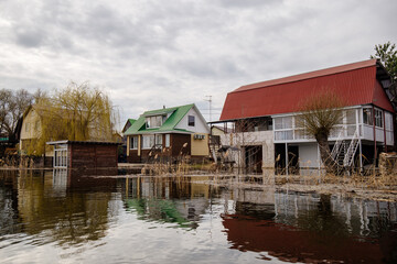 Flooded rural houses. Concept of disaster