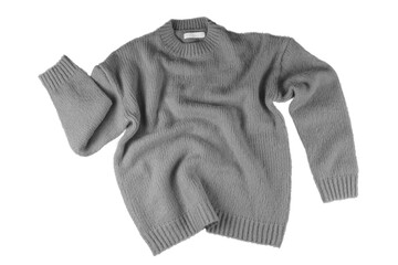Gray flying crumpled women's autumn knitted sweater isolated on white, transparent background....