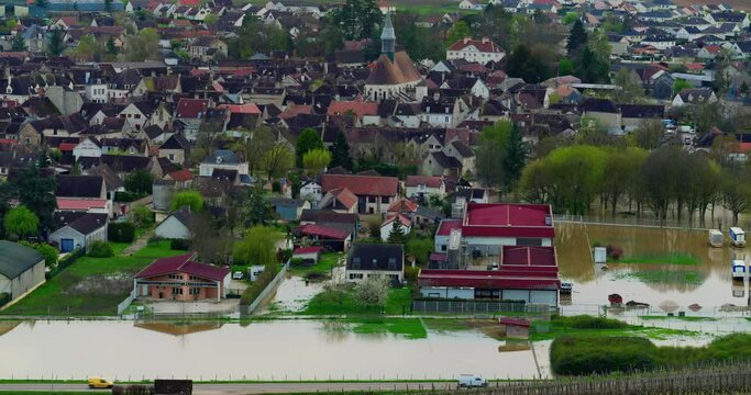 Natural disaster in Burgundy, France. Water flooded a city in the Yonne department. Floods in the center of France. Yonne river in flood in Chablis town. Spring flood 2024