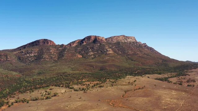 Aerial landing in Flinders ranges of South Australia in view of Wilpena Pound as 4k.
