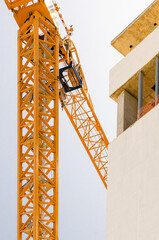 yellow crane on a construction site