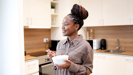 African American woman enjoying breakfast
