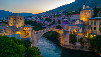 Naklejka premium Sunset view of the old Mostar bridge in Bosnia and Herzegovina