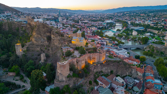 Sunset view of Narikala fortress overlooking downtown Tbilisi in Georgia