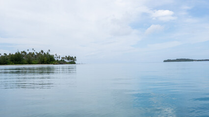 Tropical island in Indonesia with white sand and turquoise beaches